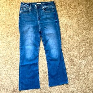 NEW! Sneak peek mid rise flare jeans size 28